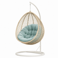 Chaise suspendue en rotin avec coussin bleu vert